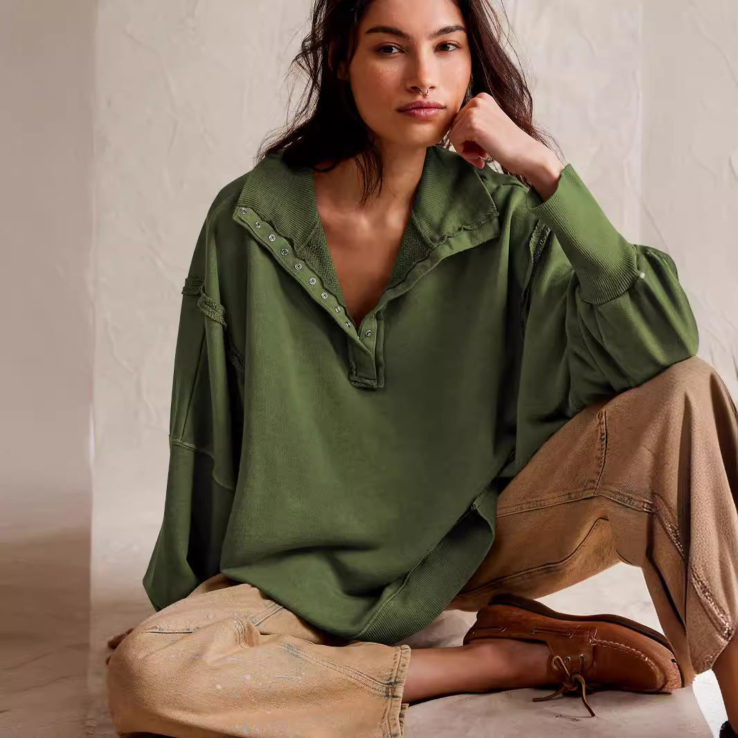 This is a high-quality, stylish women's wear with lantern sleeves, decorative lines, split lapels, and a loose sweatshirt