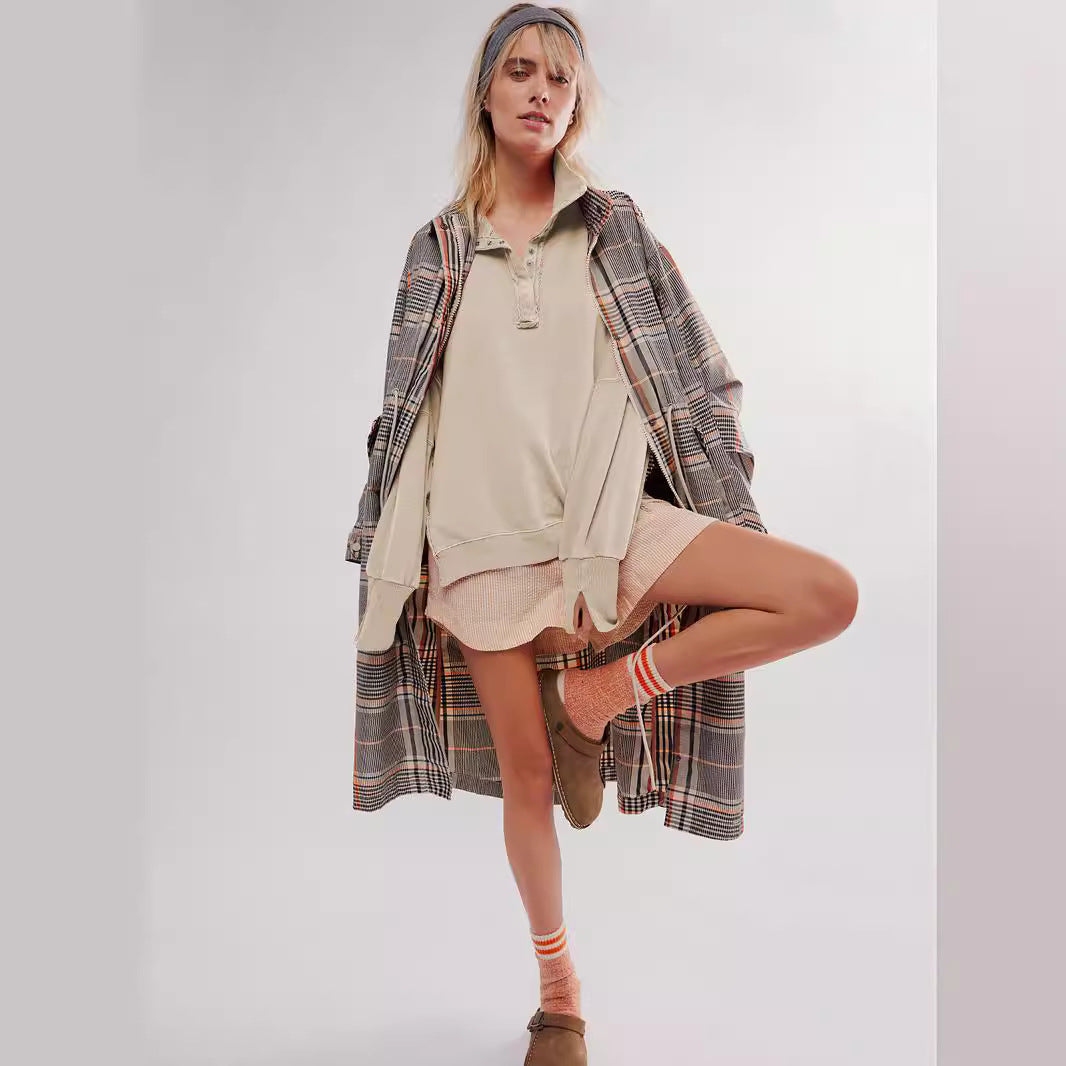 This is a high-quality, stylish women's wear with lantern sleeves, decorative lines, split lapels, and a loose sweatshirt